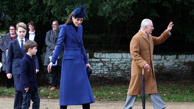 Britain's Catherine, Princess of Wales (C) with her sons and King Charles III (R) after attending the Royal Family's traditional Christmas Day service at St Mary Magdalene Church on the Sandringham Estate in eastern England, on December 25, 2023. Picture: AFP.