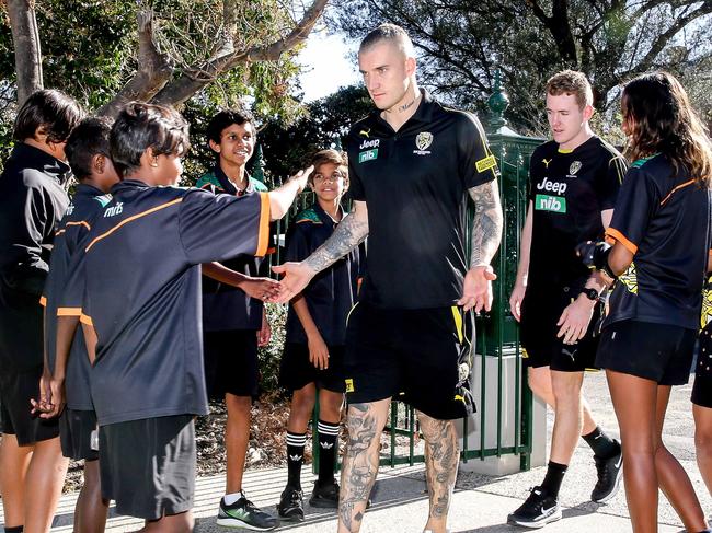 Senior coach, Damien Hardwick available to mediaRichmond AFL players and staff will have lunch with the students from MITS. Dan Rioli's parents Bradley Rioli and Belinda Punguatji. They are down from the Tiwi Islands and designed Richmond's Dreamtime jumper. We will need to get a family photo please. This will run in Tracey's section on Saturday,. About MITS: Each year, a class of Indigenous boys and girls (around Year Seven age) from communities around Australia come to live at ÔLockingtonÕ, the MITS boarding house in Richmond. They to go school inside the Richmond Football Club each day, where they study a curriculum focused on numeracy and literacy, delivered by MITS' teachers. Dustin Martin arrives. Picture: Tim Carrafa