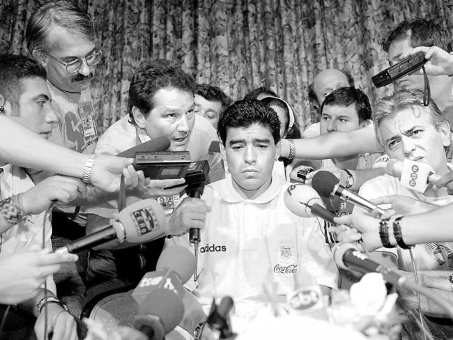 A startled Maradona fronts the press following his drug ban.