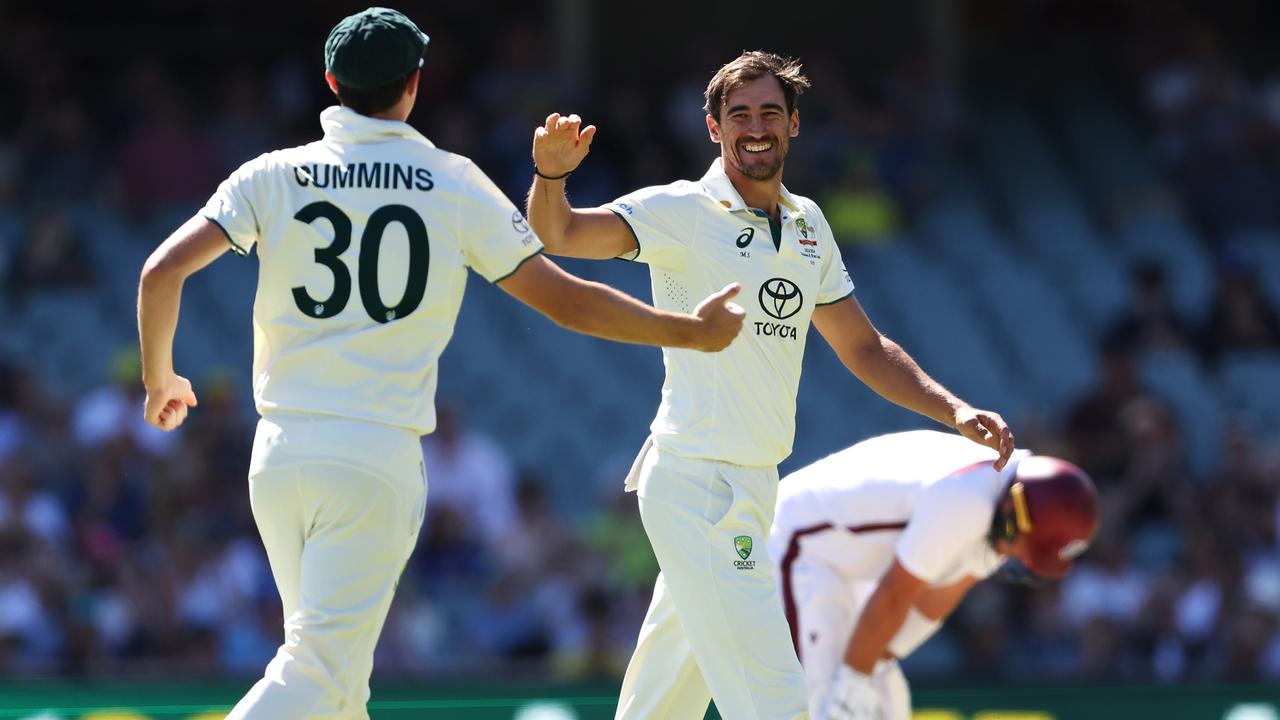 Mitchell Starc and Pat Cummins celebrate after their Joshua Da Silva plan worked early on day three. Picture: Paul Kane/Getty Images