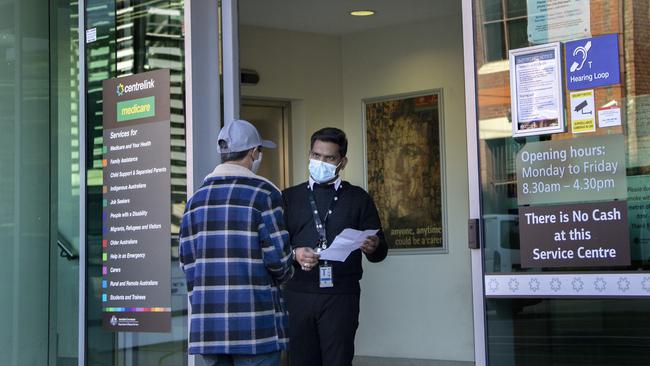 A customer talks to a staff member at Centrelink Abbotsford in Melbourne earlier this month. Picture: NCA NewsWire / David Geraghty