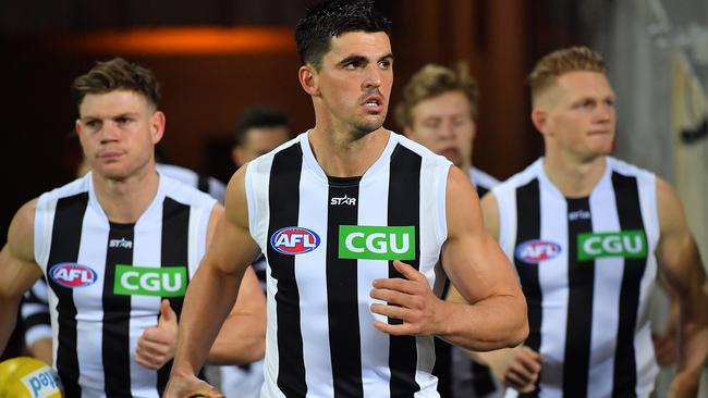 Scott Pendlebury leads Collingwood out.