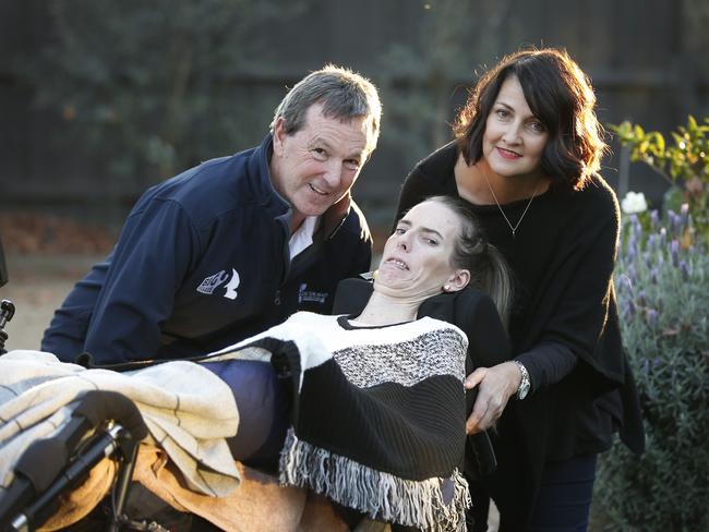 Neale Daniher with Ange Cunningham and Catherine Baker last year. Picture: David Caird