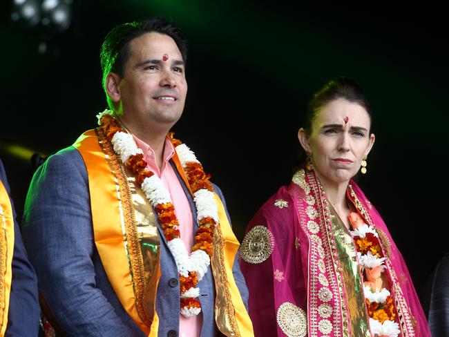 AUCKLAND, NEW ZEALAND - OCTOBER 12: New Zealand Prime Minister Jacinda Ardern (R) and National Party leader Simon Bridges pictured on stage during the 18th Auckland Diwali Festival on October 12, 2019 in Auckland, New Zealand. Auckland Diwali Festival is one of Auckland's biggest and most colourful cultural festival, celebrating traditional and contemporary Indian culture. (Photo by Phil Walter/Getty Images)