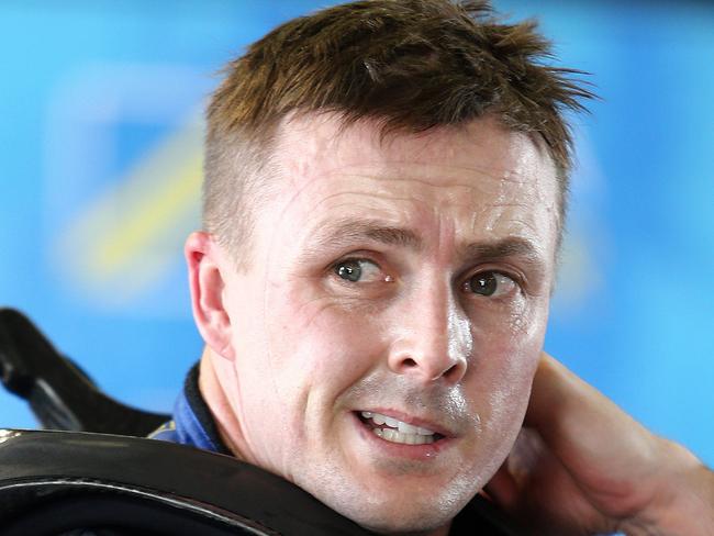 The Supercheap Auto Bathurst 1000 at Mount Panorama in Bathurst, NSW today. Pictured is Mark Winterbottom in the garage after swapping with co-driver Steve Owen. Photo: Tim Hunter.