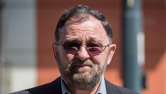 Neville Donohue leaves the Ringwood Magistrate's Court after photos of him wearing medals on Anzac Day went viral. Picture: Jake Nowakowski.