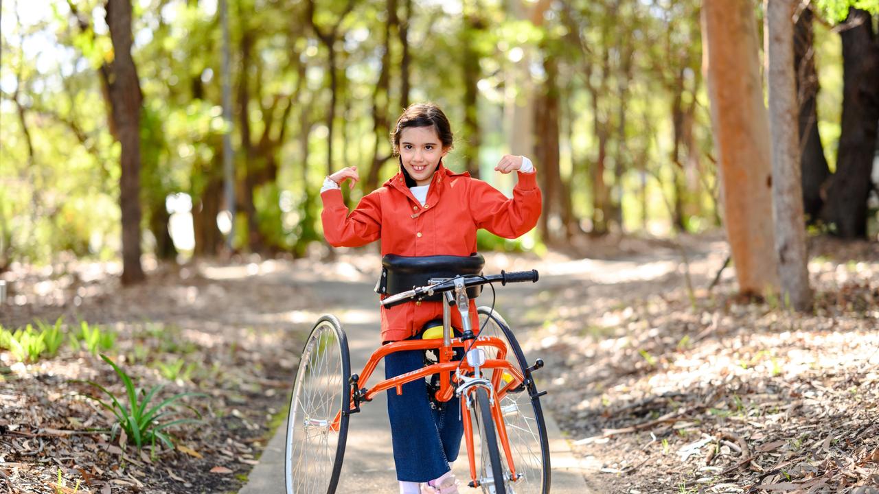 Tilly is looking forward to STEPtember to raise awareness and help people understand why people like her use a wheelchair, why she uses her sticks. Picture: Supplied