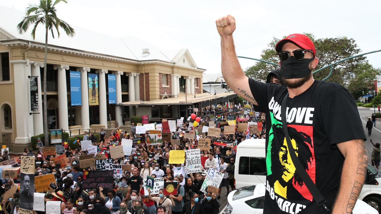 Zephaniah Thomas with thousands of others take to the streets of Cairns in support of the Black Lives Matter movement. Picture: PETER CARRUTHERS