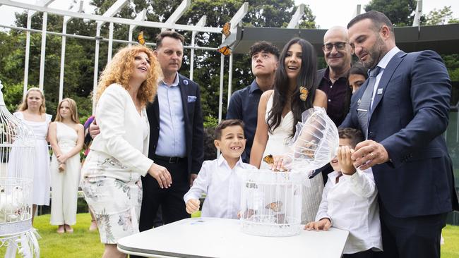 The Abdallah and Sakr families release butterflies in honour of Antony, Angelina, Sienna and Veronique. Picture: Jenny Evans