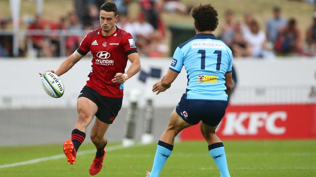 Will Jordan of the Crusaders kicks ahead against the Waratahs in Round 1 of this year’s Super Rugby competition. Top-level rugby down under in future is likely to feature only teams from Australia and New Zealand. Picture: Getty Images