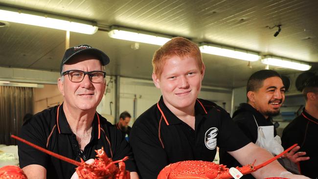 23rd December 2020, Manager Michael Baggot with staff member Eli Winning from Tasman Star Seafoods. Photo: Scott Powick Newscorp