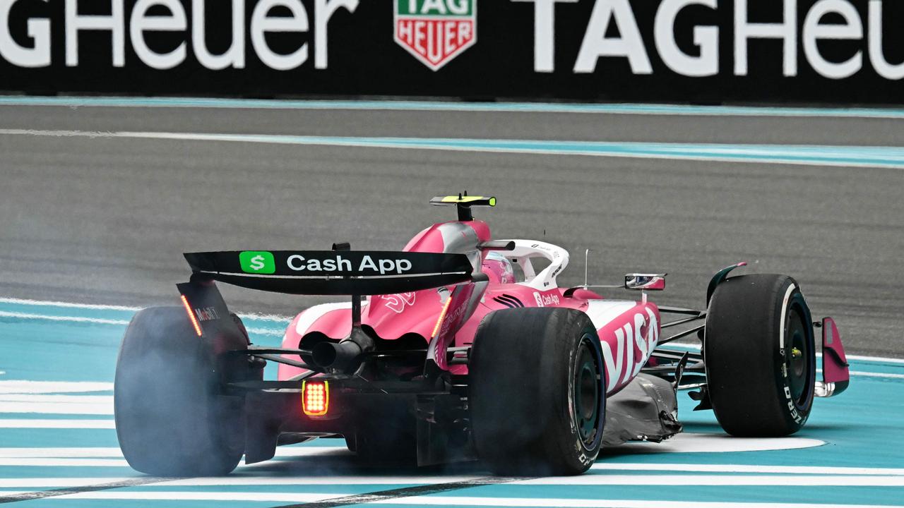 Liam Lawson is seen on the side of the track after contact with Alpine's Jack Doohan. Photo by Chandan Khanna / AFP.