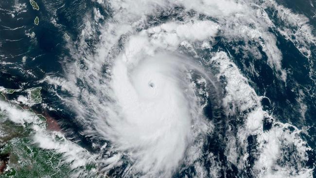 This National Oceanic and Atmospheric Administration (NOAA)/GOES satellite handout image shows Hurricane Beryl. Beryl, the first hurricane of the 2024 Atlantic season, strengthened into an "extremely dangerous" Category 4 storm Sunday. (Photo by HANDOUT / NOAA/GOES / AFP)