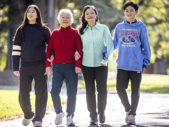 ‘In her arms at last, full of love’ … Cheng Lei is making the most of time with her mother Hua and children Ava and Alex. Picture: Jake Nowakowski