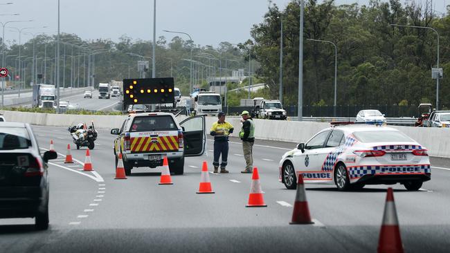 Police have closed eastbound lanes of the Logan Motorway after the shooting. Picture: Tara Croser.