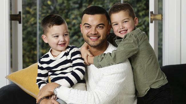 “He will call me Guy Sebastian out in public.” The singer with sons Archie, 3, and Hudson, 5, in Double Bay. Picture: Justin Lloyd