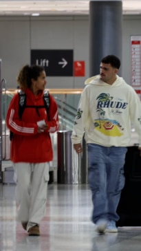 Fowler and Cleary hand-in-hand at Sydney Airport