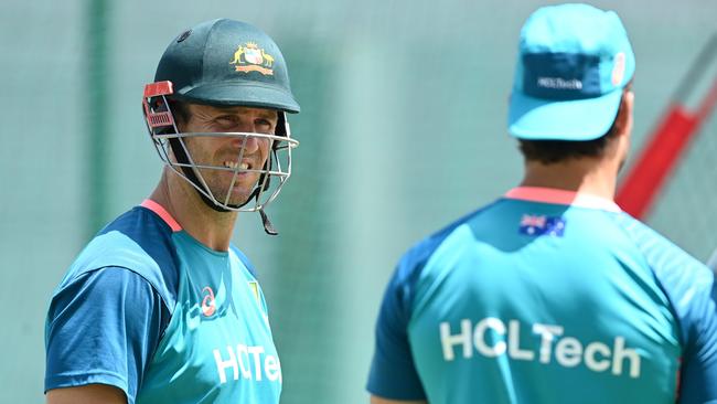 BRIDGETOWN, BARBADOS - JUNE 07: Mitchell Marsh of Australia speaks with Marcus Stoinis during a net session as part of the ICC Men's T20 Cricket World Cup West Indies & USA 2024 at Kensington Oval on June 07, 2024 in Bridgetown, Barbados. (Photo by Gareth Copley/Getty Images)