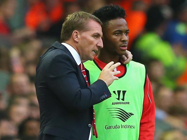 LIVERPOOL, ENGLAND - SEPTEMBER 13: Brendan Rodgers, manager of Liverpool talks to Raheem Sterling of Liverpool during the Barclays Premier League match between Liverpool and Aston Villa at Anfield on September 13, 2014 in Liverpool, England. (Photo by Alex Livesey/Getty Images)