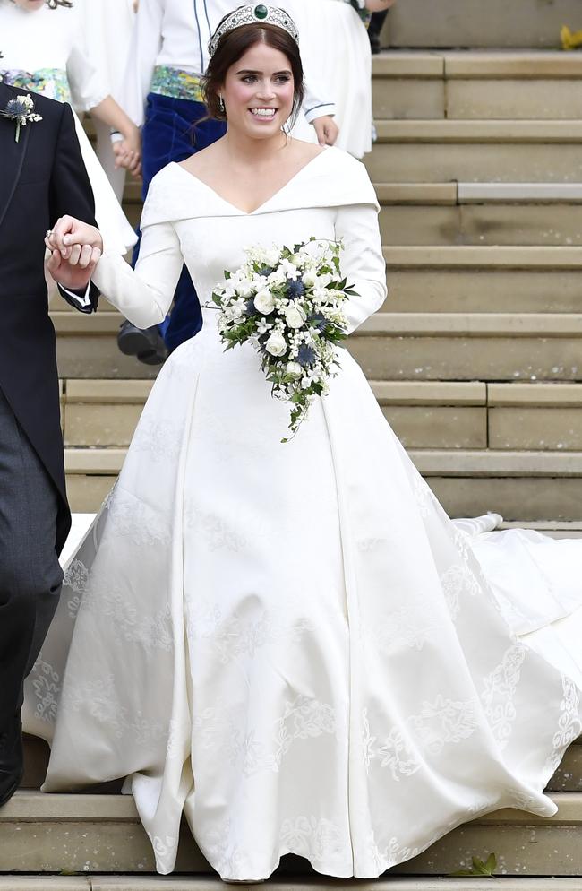 Princess Eugenie of York and her husband Jack Brooksbank leave after wedding at St. George’s Chapel on October 12, 2018 in Windsor, England. (Photo by Toby Melville - WPA Pool/Getty Images)