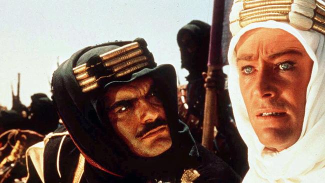 A poster of the 1962 film "Lawrence of Arabia" featuring actors Omar Sharif and Peter O'Toole.