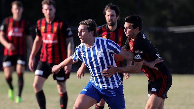 Darcey Den Ouden of Yarraville takes on the Geelong defence during the State League soccer match between Yarraville FC and Geelong played at McIvor Reserve, Yarraville on Saturday 7th April, 2018.