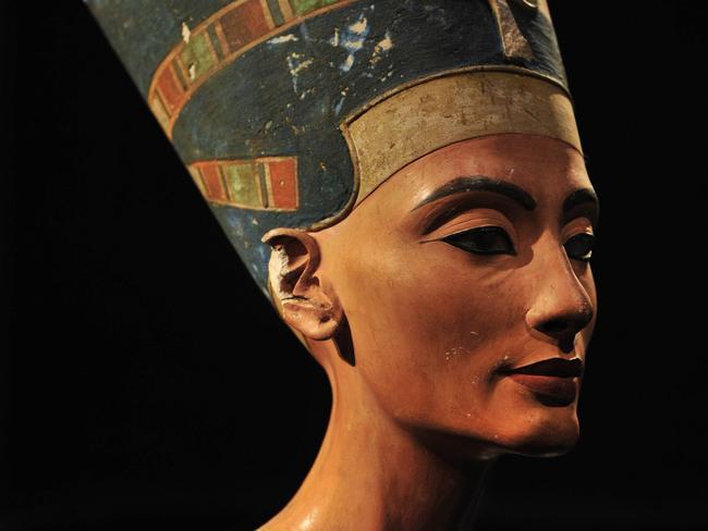 (FILES) A file picture taken on February 7, 2011 shows the bust of the Ancient Egyptian Queen Nefertiti in Berlin's "Neues Museum" (New Museum). Egypt will make a formal request to Germany for the return of the 3,400 year-old bust of fabled Queen Nefertiti, the state minister for antiquities said on May 3, 2011 but Germany said the bust will remain in Berlin. The German government has denied repeated Egyptian requests to have the bust back, insisting there is nothing illegal about its acquisition. AFP PHOTO / JOHN MACDOUGALL