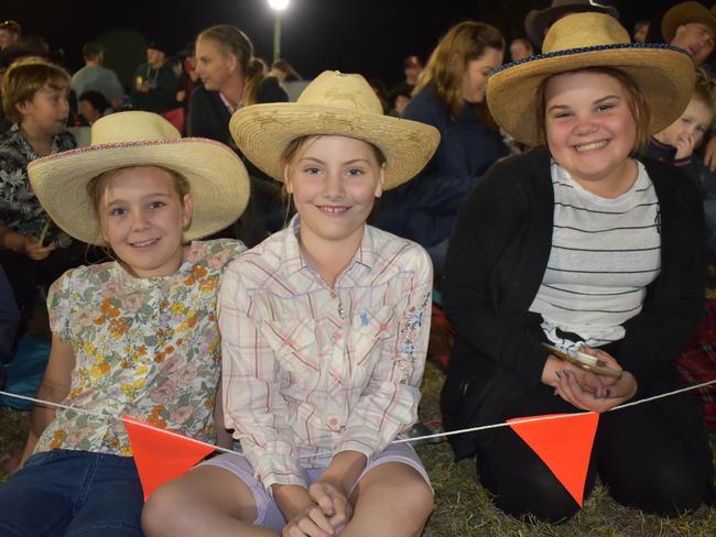 Billi Brown, Lizzy Tait, and Madi Rowe of Bowen had front row seats at the Big Bash rodeo. Picture: Kirra Grimes