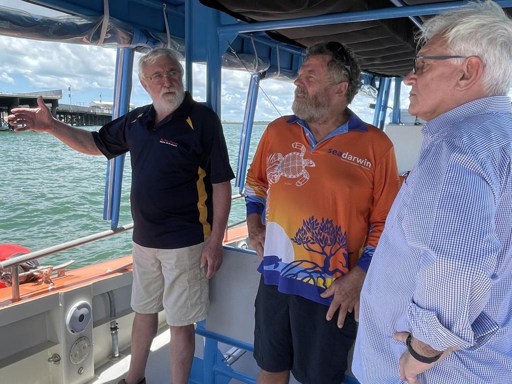 Heritage consultant Mike Owen, SeaDarwin owner Jim Smith and City of Darwin Lord Mayor Kon Vatskalis on a Bombing of Darwin tour. Picture: Nathaniel Chambers