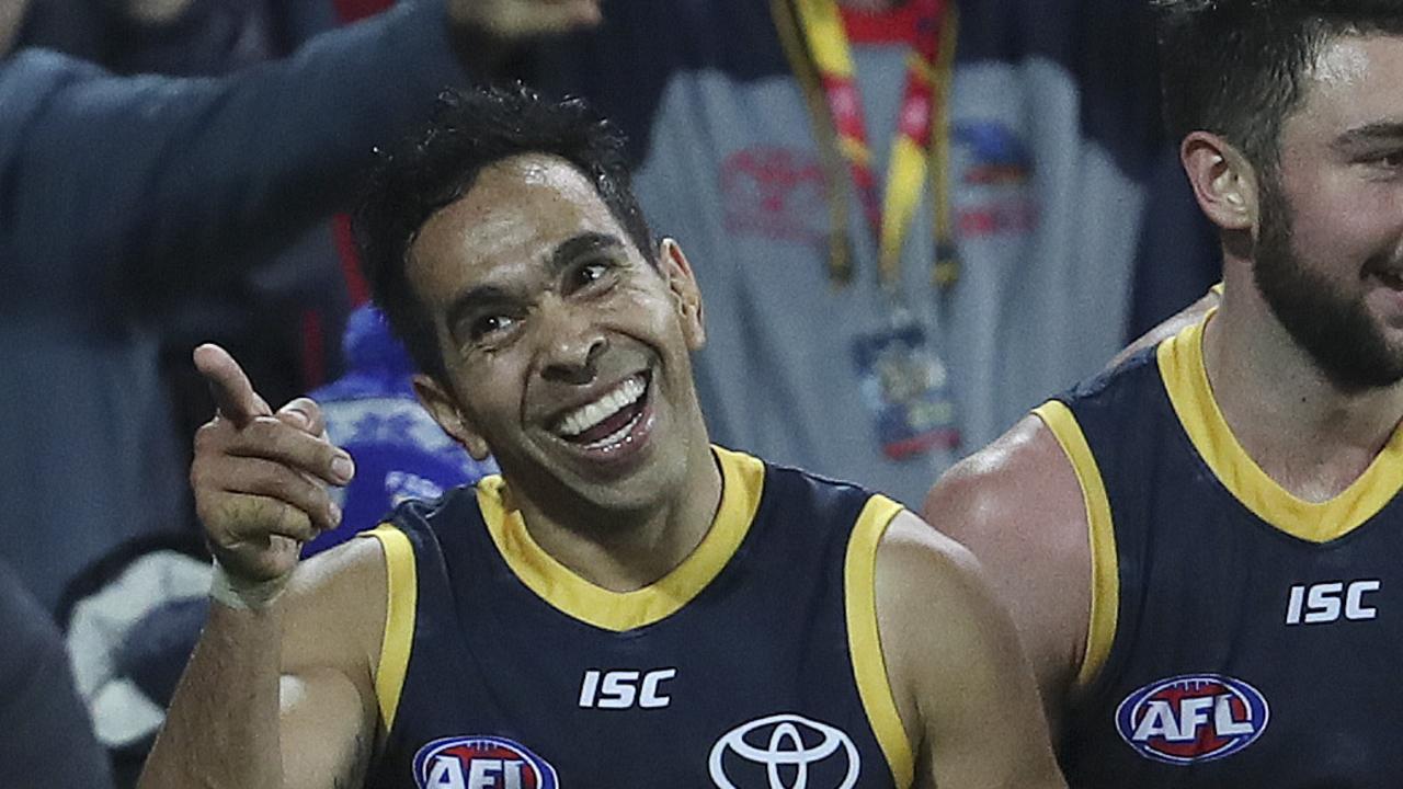 Eddie Betts smiles at Sydney Stack after his late goal in Adelaide’s victory over Richmond. Picture: Sarah Reed.
