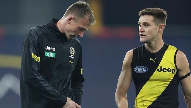 Dylan Grimes talks with Jayden Short after finishing the match on the sidelines. Picture: Michael Klein