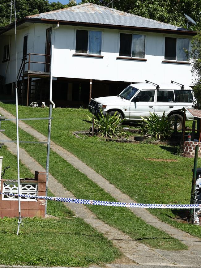 Queensland Police officers guard a crime scene at Love Street, Mareeba, where a man armed with a knife was shot dead by police after a tense, hours long stand off on Saturday afternoon. Picture: Brendan Radke