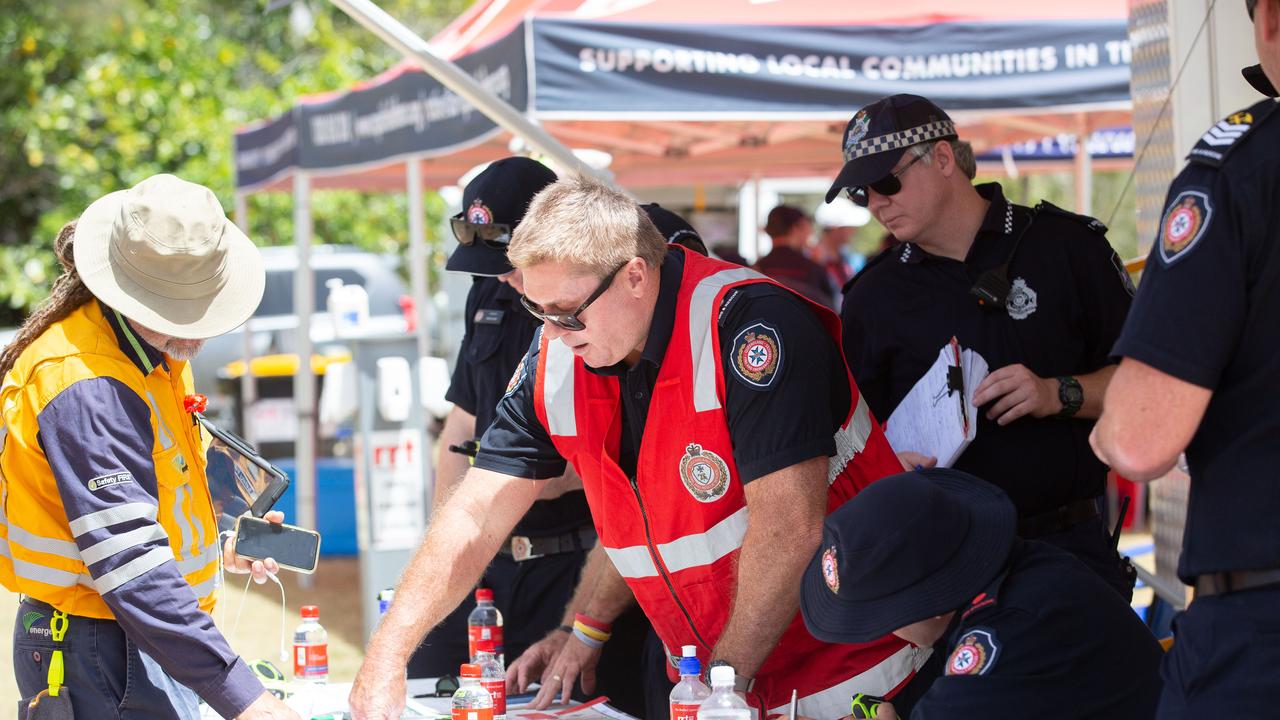 Firefighters are briefed at the control centre in Chaplin Park in Noosa. Picture: AAP Image/Rob Maccoll