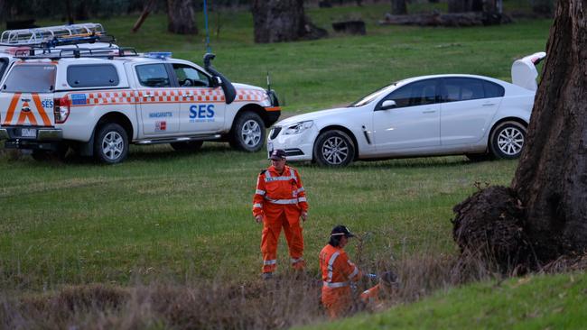 Police on the scene at Richardsons Bend Campground near Barnawartha North. Picture: Simon Dallinger