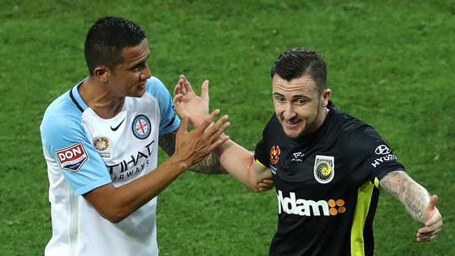 Roy O'Donovan reacts to Tim Cahill after he was sent off.