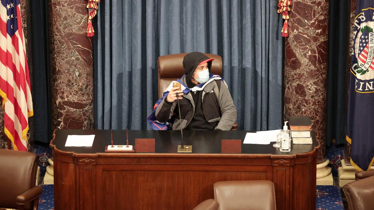 A protester sits in the Senate Chamber in Washington D.C. Picture: Win McNamee/Getty Images/AFP