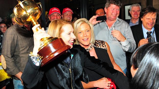 Gai Waterhouse shows off the trophy at the Fiorente Melbourne Cup after party at The French Brasserie