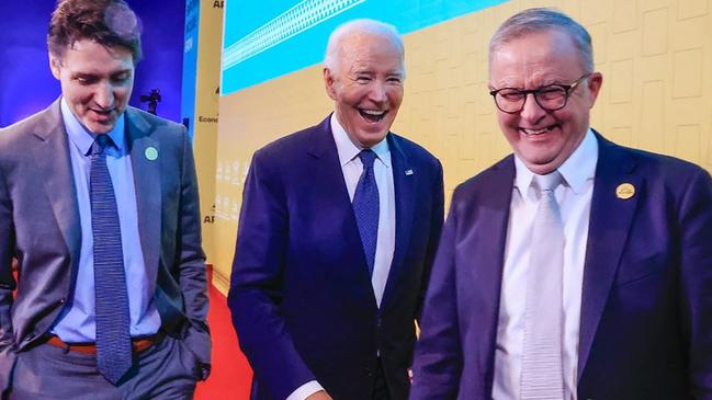 The US President shares a laugh with Canada’s Prime Minster Justin Trudeau (left) and Australian PM Anthony Albanese at the APEC Summit last year. Picture: Andina / AFP