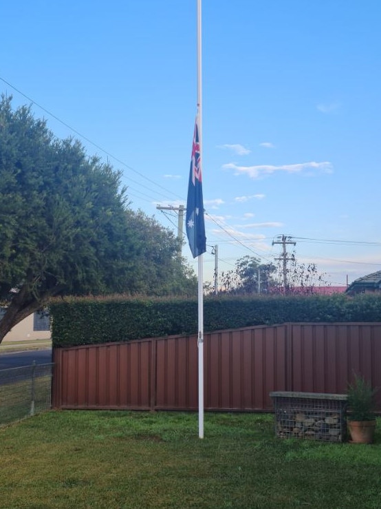 Singleton locals have been putting their flags at half-mast to show respect for the 10 people who lost their lives in the horror bus crash. Picture: Supplied