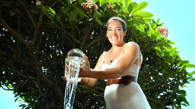 PURITY: Mallika Foord with a water purifier that could change your life.  Photo: John McCutcheon / Sunshine Coast Daily