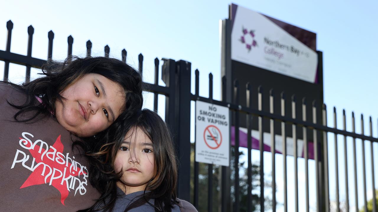 Sisters Thani, 9, and Alice, 7, outside their school Northern Bay College’s Hendy St campus. Picture: Alison Wynd