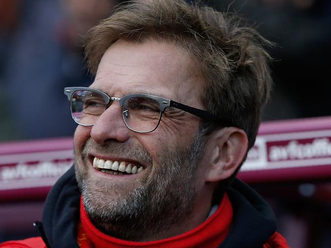 Liverpool's German manager Jurgen Klopp reacts ahead of the English Premier League football match between Aston Villa and Liverpool at Villa Park in Birmingham, central England on February 14, 2016. / AFP / ADRIAN DENNIS / RESTRICTED TO EDITORIAL USE. No use with unauthorized audio, video, data, fixture lists, club/league logos or 'live' services. Online in-match use limited to 75 images, no video emulation. No use in betting, games or single club/league/player publications. /