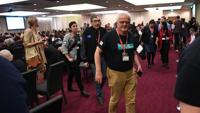 Unionists exit the Victorian Labor State Conference as the Deputy Leader of the Australian Labor Party, Richard Marles prepares to speak in Melbourne on Saturday.