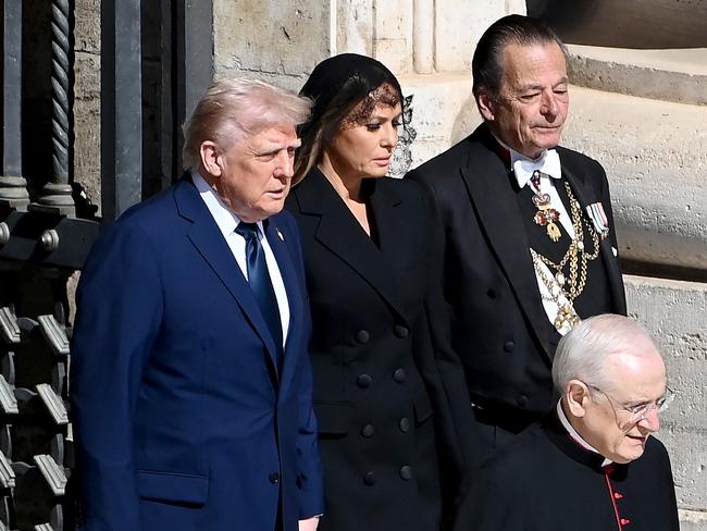 Donald Trump and Melania Trump (sporting a “Mantilla” veil), arrive for late Pope Francis' funeral ceremony at St Peter's Square in The Vatican. Picture: AFP
