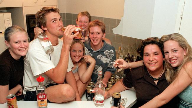 Schoolies week -   Lto R  Melitte Hoskins, 'Spud' Andrew Kinsella (second from left), Amy Baines, Radel Armstrong , 'Meggsie' James O'Donnell (third from right), and Sarah bartholomeusz  ..pict Mick/Toal Nov 20 1997 (one person unidentified) youth drinking liquor  gold coast  headshot