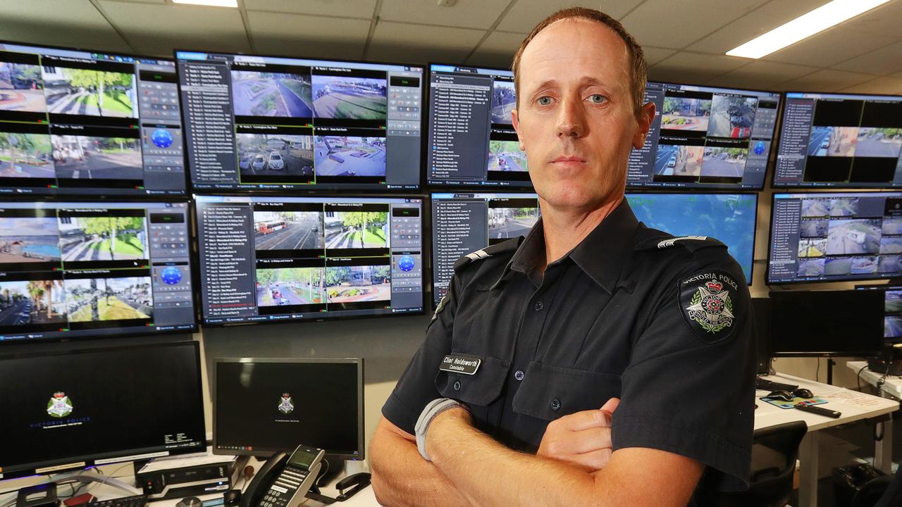 Senior Constable Clint Holdsworth inside the CCTV monitoring and control room at Geelong police station in 2023. Picture: Alan Barber.