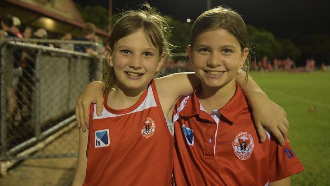 Friends Abby Neal (9) and Cleo Rayson (10) at the opening game of the NTFL 22/23 season. Picture: (A)manda Parkinson