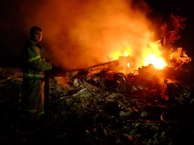 A firefighter stands among the wreckage. DOMINIQUE FAGET/AFP/Getty Images