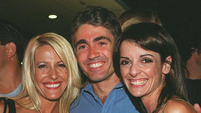 APRIL 27, 2001 : Former 500cc world champion Mick Doohan with wife Donna (L) & friend Selina Sines attend 1st Birthday of Drink Nightclub on the Gold Coast 27/04/01. Pic Marc Robertson.Motor Racing Dooh/famSocial / Queensland