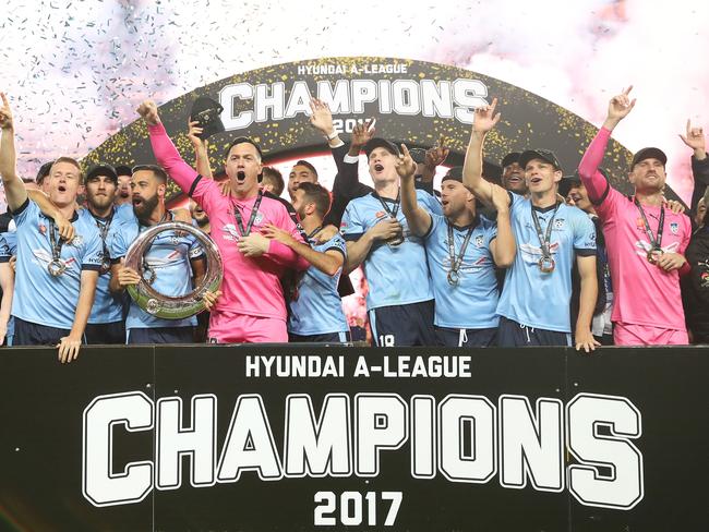 Andrew Redmayne (far right) celebrates with his Sydney FC teammates. Picture: Brett Costello
